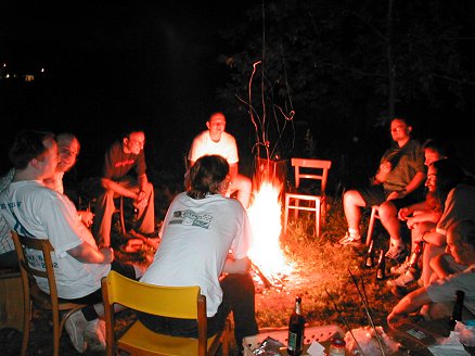 [Photo: Camp fire]